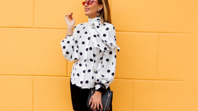 Graceful Woman Stylish Casual Outfit Posing With Black Leather Luxury Bag 1 800x450